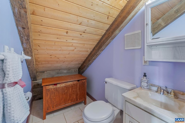 711 Jefferson Dr, Palmyra, VA 22963 - bathroom featuring lofted ceiling, wood ceiling, toilet, vanity, and tile patterned flooring