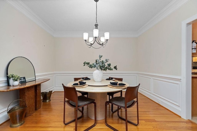 101 Jasper Ln, Waynesboro, VA 22980 - dining area featuring a chandelier, crown molding, light wood-type flooring, and wainscoting