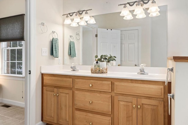 101 Jasper Ln, Waynesboro, VA 22980 - bathroom with a chandelier, double vanity, and baseboards