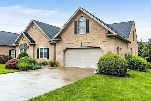 101 Jasper Ln, Waynesboro, VA 22980 - traditional-style home with a garage, brick siding, driveway, and a front yard