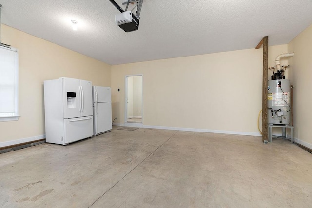 101 Jasper Ln, Waynesboro, VA 22980 - garage featuring white fridge with ice dispenser, freestanding refrigerator, a garage door opener, gas water heater, and baseboards