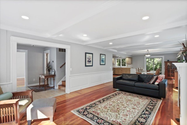 162 Hartman Ct, Mcgaheysville, VA 22840 - living area with stairs, light wood finished floors, beam ceiling, recessed lighting, and a decorative wall