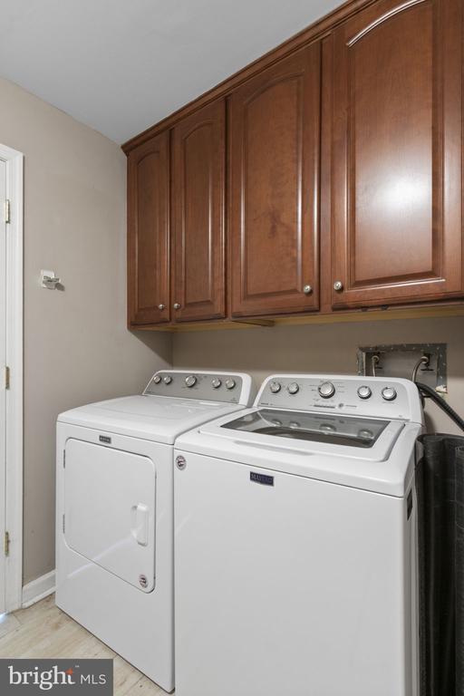 9 Twin Springs Dr, Fredericksburg, VA 22407 - washroom with washer and clothes dryer and cabinet space