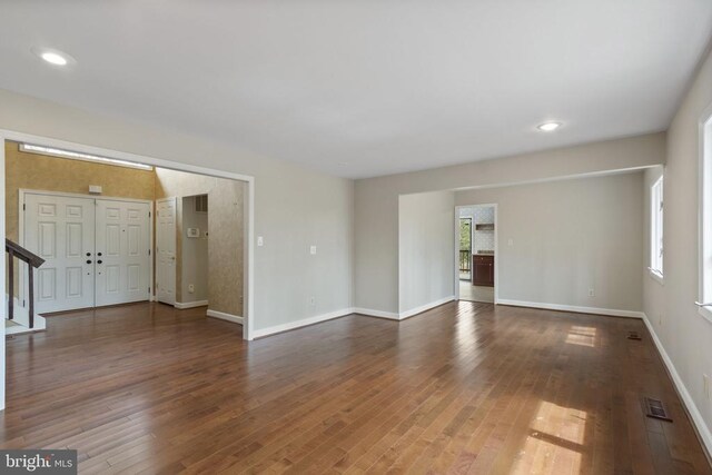 9 Twin Springs Dr, Fredericksburg, VA 22407 - unfurnished living room featuring hardwood / wood-style flooring, baseboards, and recessed lighting
