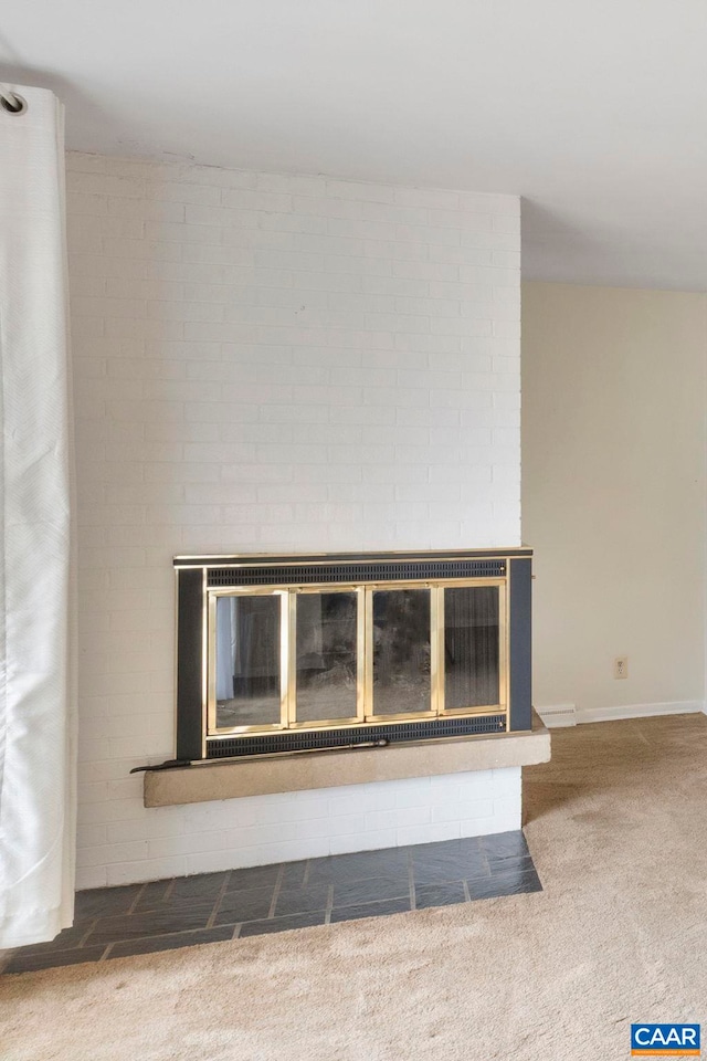 1304 Lester Dr, Charlottesville, VA 22901 - detailed view of a fireplace, carpet, and baseboards