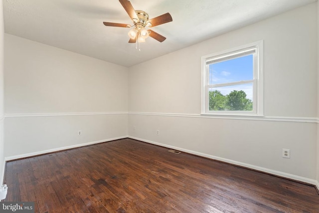  - empty room with wood finished floors and ceiling fan