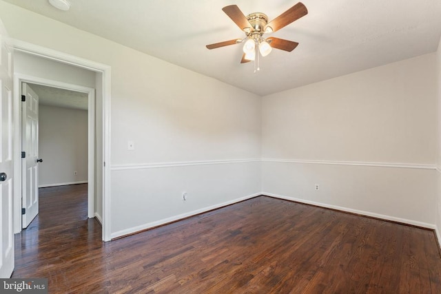  - empty room featuring wood finished floors and a ceiling fan