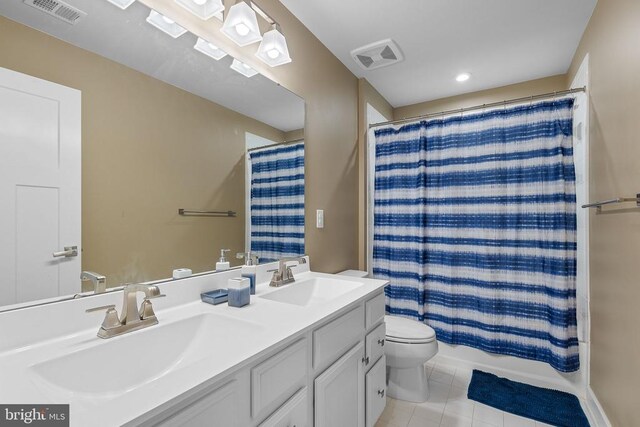  - bathroom with tile patterned flooring, double vanity, and shower / bath combination with curtain