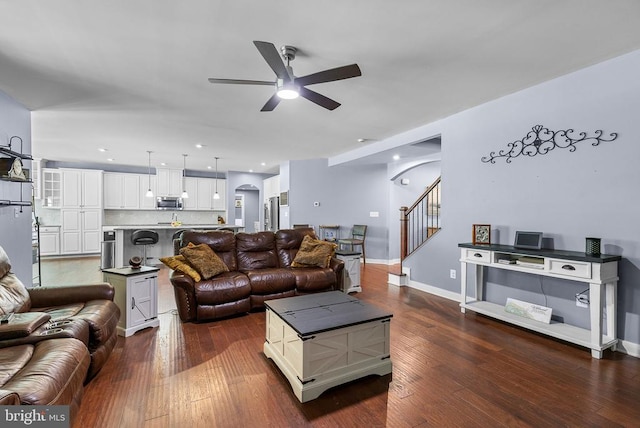  - living room featuring a ceiling fan, stairway, dark wood-style floors, and recessed lighting