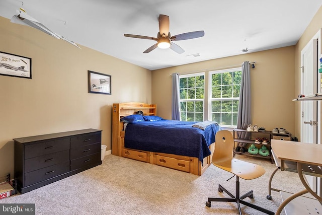  - bedroom featuring carpet and a ceiling fan