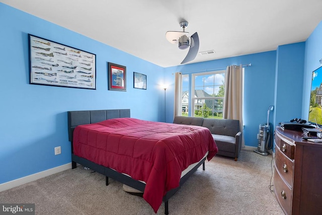  - carpeted bedroom with baseboards