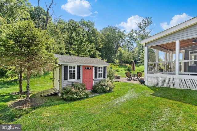  - view of shed featuring a sunroom