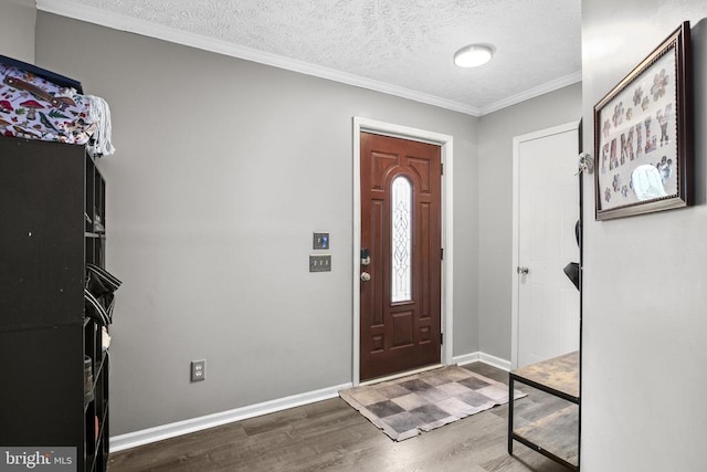 4253 Rolling Hills Dr, Culpeper, VA 22701 - entrance foyer featuring wood finished floors, a textured ceiling, and ornamental molding