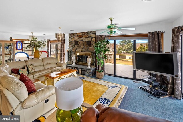 41 Carr Cir, Mineral, VA 23117 - carpeted living room featuring ceiling fan and a stone fireplace