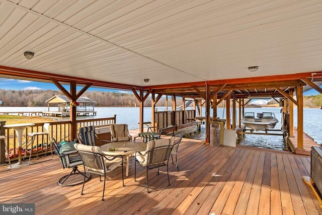 41 Carr Cir, Mineral, VA 23117 - wooden deck featuring boat lift, a dock, and a water view