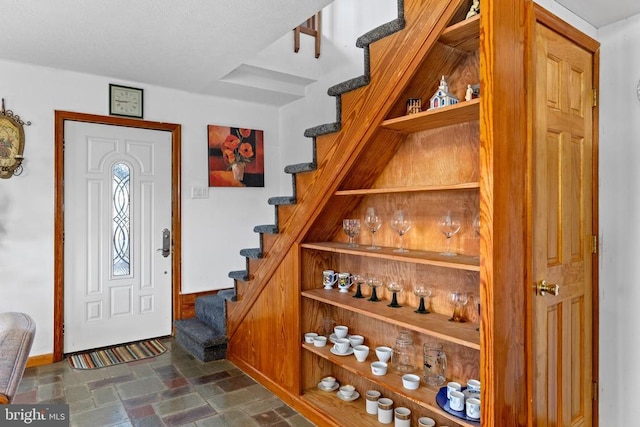 41 Carr Cir, Mineral, VA 23117 - foyer with stairs, baseboards, and dark stone finish floors