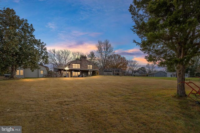 41 Carr Cir, Mineral, VA 23117 - yard at dusk featuring a yard