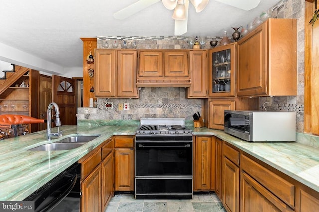41 Carr Cir, Mineral, VA 23117 - kitchen featuring black appliances, a sink, brown cabinets, and backsplash