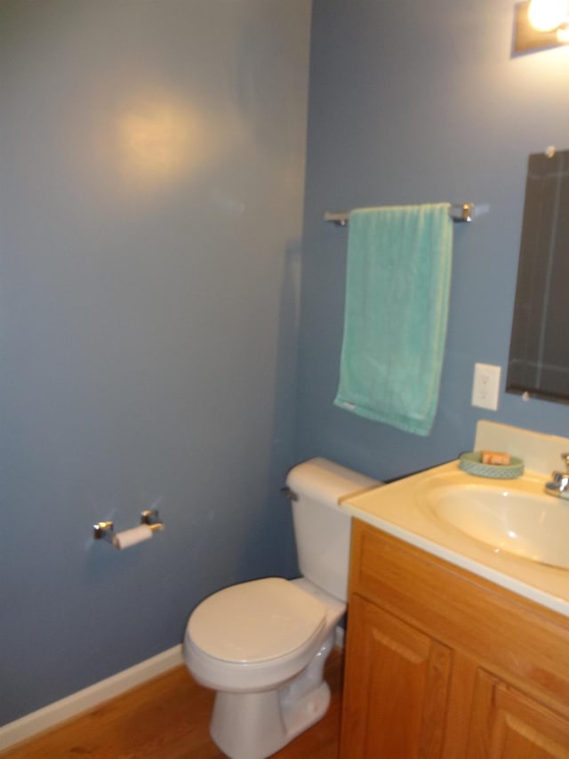 196 Emerson Ln, Harrisonburg, VA 22801 - bathroom with vanity, toilet, wood finished floors, and baseboards