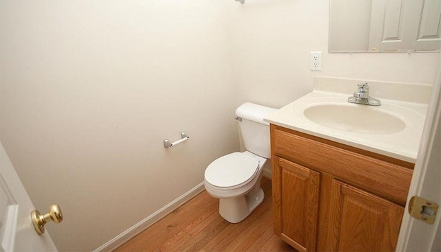 196 Emerson Ln, Harrisonburg, VA 22801 - bathroom featuring wood finished floors, toilet, vanity, and baseboards