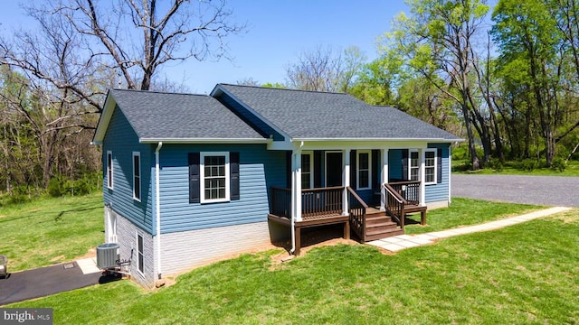 2905 Twymans Mill Rd, Madison, VA 22727 - view of front of property featuring a porch, roof with shingles, a front yard, and central AC unit