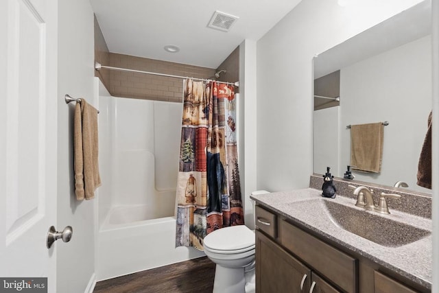 2905 Twymans Mill Rd, Madison, VA 22727 - bathroom with toilet, wood finished floors, vanity, and shower / bath combo with shower curtain