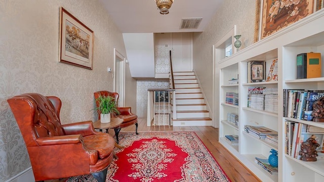 111 Main St S, Bridgewater, VA 22812 - sitting room with hardwood / wood-style flooring, stairs, and wallpapered walls