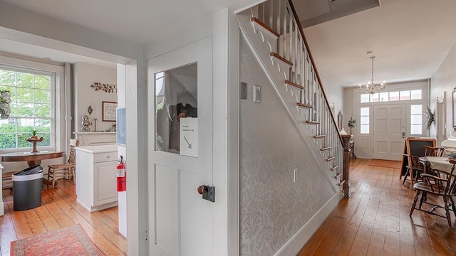 111 Main St S, Bridgewater, VA 22812 - hallway featuring light wood-style floors, plenty of natural light, stairs, and a chandelier