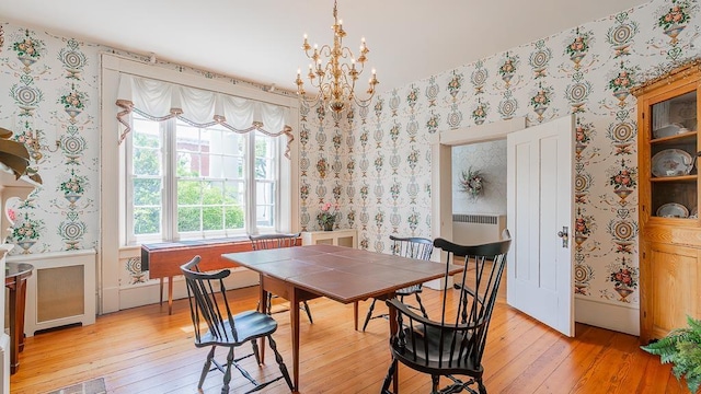 111 Main St S, Bridgewater, VA 22812 - dining area featuring wallpapered walls, light wood finished floors, healthy amount of natural light, and a chandelier