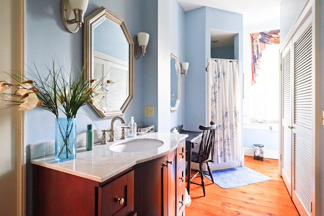 111 Main St S, Bridgewater, VA 22812 - bathroom with vanity, wood finished floors, and a closet