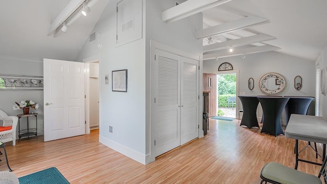 111 Main St S, Bridgewater, VA 22812 - living room with rail lighting, light wood-type flooring, ceiling fan, and baseboards