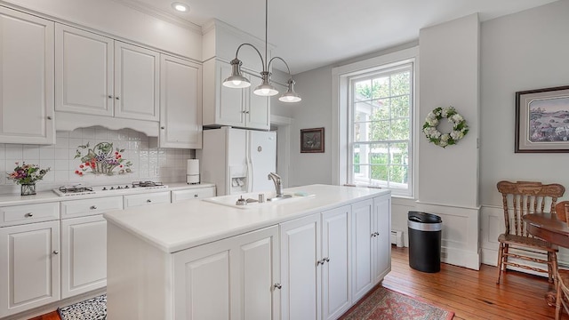 111 Main St S, Bridgewater, VA 22812 - kitchen featuring a sink, white appliances, light countertops, and white cabinets