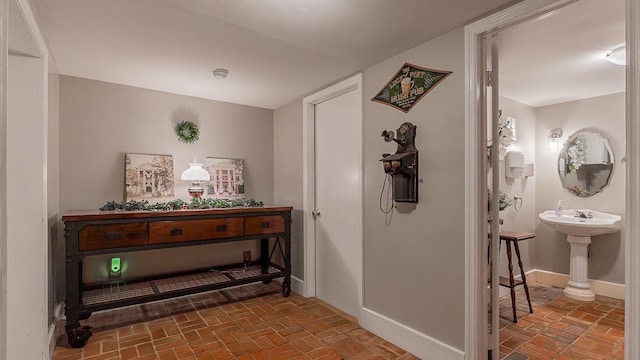 111 Main St S, Bridgewater, VA 22812 - hallway featuring brick flooring and baseboards