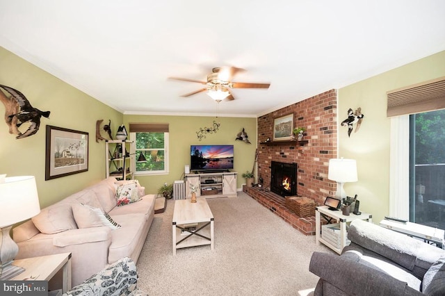 10415 Shaw Dr, Spotsylvania, VA 22553 - living room featuring healthy amount of natural light, a ceiling fan, a brick fireplace, carpet floors, and crown molding