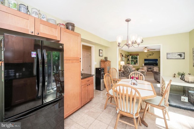 10415 Shaw Dr, Spotsylvania, VA 22553 - dining room featuring a chandelier, ceiling fan, and light tile patterned floors
