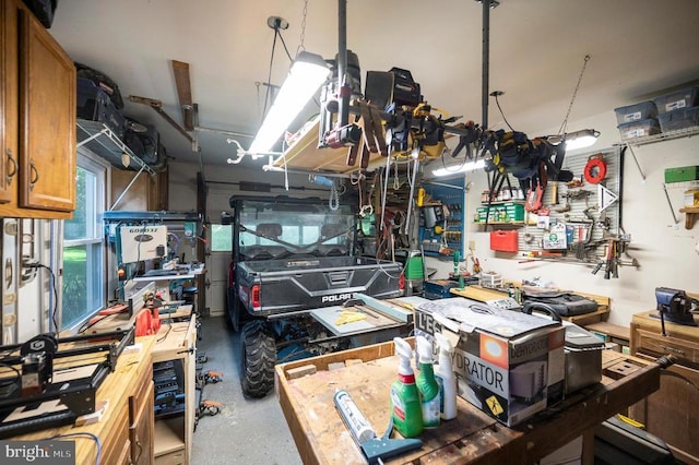 10415 Shaw Dr, Spotsylvania, VA 22553 - garage featuring a workshop area