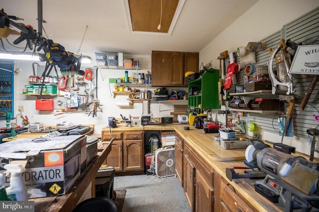 10415 Shaw Dr, Spotsylvania, VA 22553 - kitchen with open shelves and brown cabinetry
