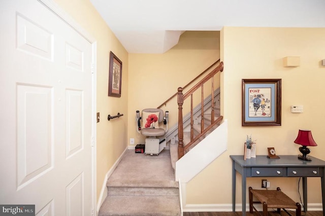 10415 Shaw Dr, Spotsylvania, VA 22553 - staircase featuring baseboards and carpet flooring