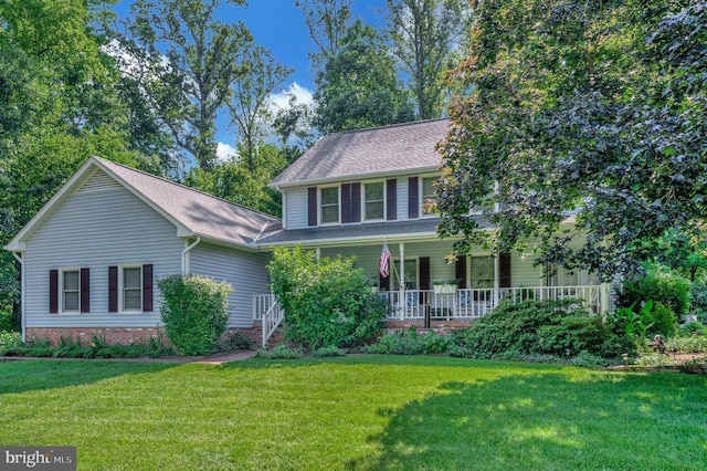 10415 Shaw Dr, Spotsylvania, VA 22553 - view of front of property featuring a front yard, a porch, and a shingled roof