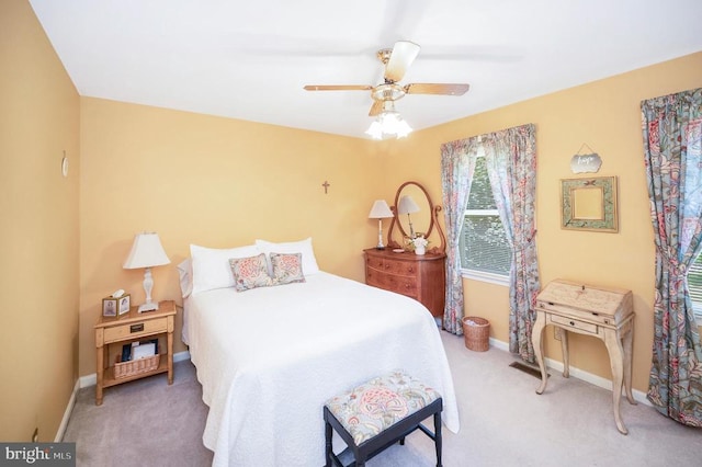 10415 Shaw Dr, Spotsylvania, VA 22553 - bedroom featuring light carpet and a ceiling fan