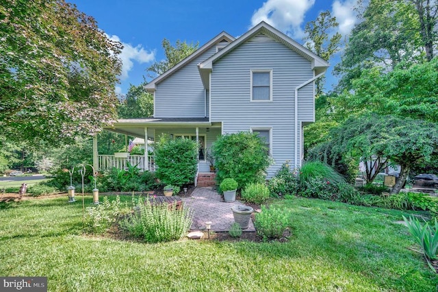 10415 Shaw Dr, Spotsylvania, VA 22553 - view of front facade with a front lawn and a porch