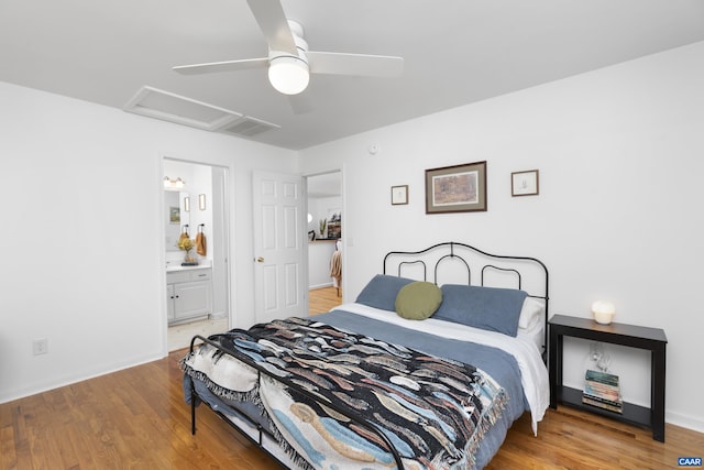 11 Holly Cir, Palmyra, VA 22963 - bedroom with attic access, light wood finished floors, ceiling fan, and ensuite bathroom