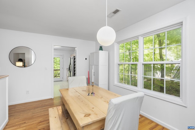 11 Holly Cir, Palmyra, VA 22963 - dining space with light wood finished floors, baseboards, and healthy amount of natural light