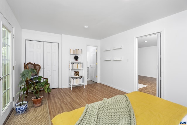 11 Holly Cir, Palmyra, VA 22963 - bedroom featuring wood finished floors, a closet, and baseboards