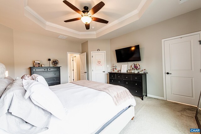 1509 Delphi Ln, Charlottesville, VA 22911 - bedroom with a raised ceiling, light colored carpet, crown molding, ceiling fan, and baseboards