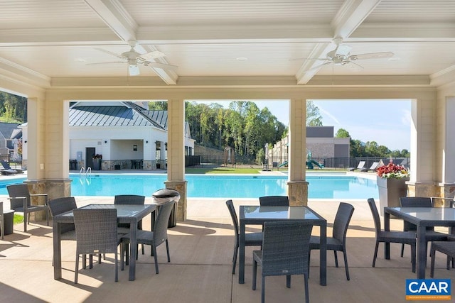 1509 Delphi Ln, Charlottesville, VA 22911 - view of swimming pool featuring a ceiling fan, outdoor dining space, and fence