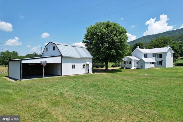 3150 Ida Rd, Luray, VA 22835 - view of grassy yard with an outbuilding, a detached garage, and a mountain view