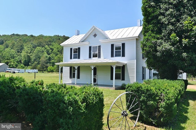 3150 Ida Rd, Luray, VA 22835 - view of front of house with a standing seam roof, a porch, a metal roof, and a front lawn
