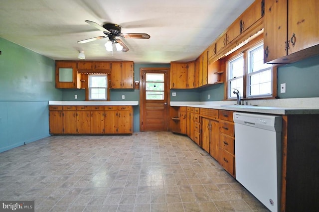 3150 Ida Rd, Luray, VA 22835 - kitchen with white dishwasher, brown cabinetry, and light countertops
