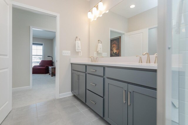 bathroom with vanity and tile patterned floors